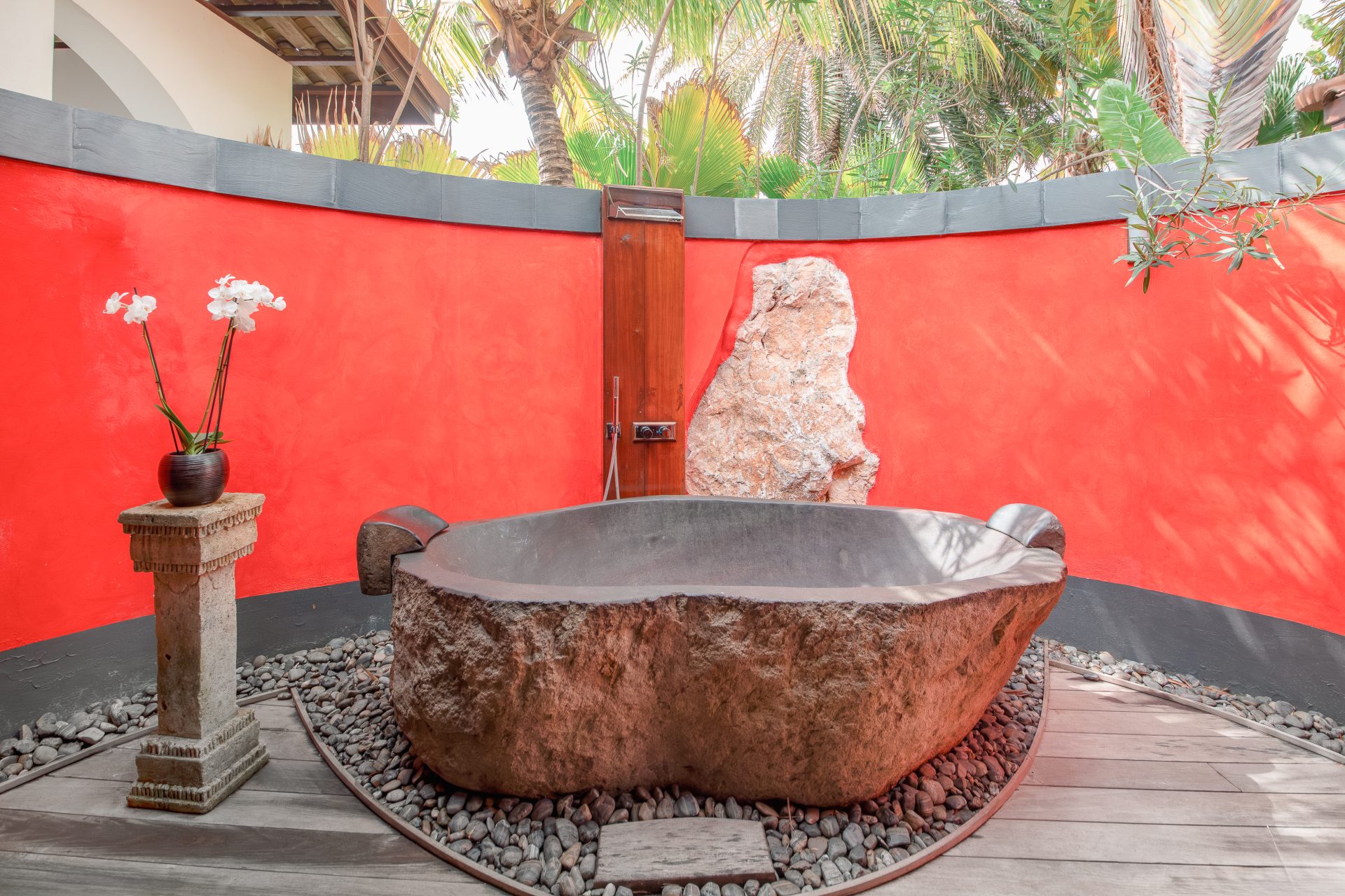 Outdoor stone bathtub at a romantic hotel in Curacao