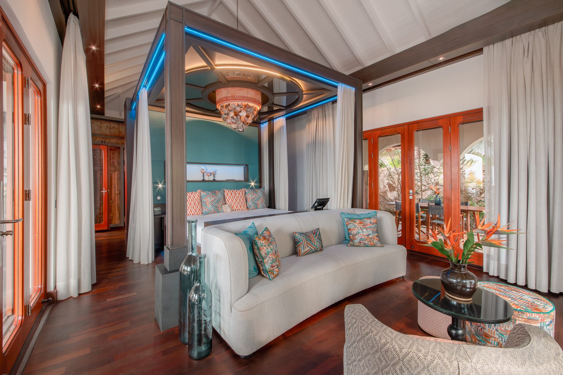 Luxury bedroom in Superior Beachfront Pool Suite with king-size bed.