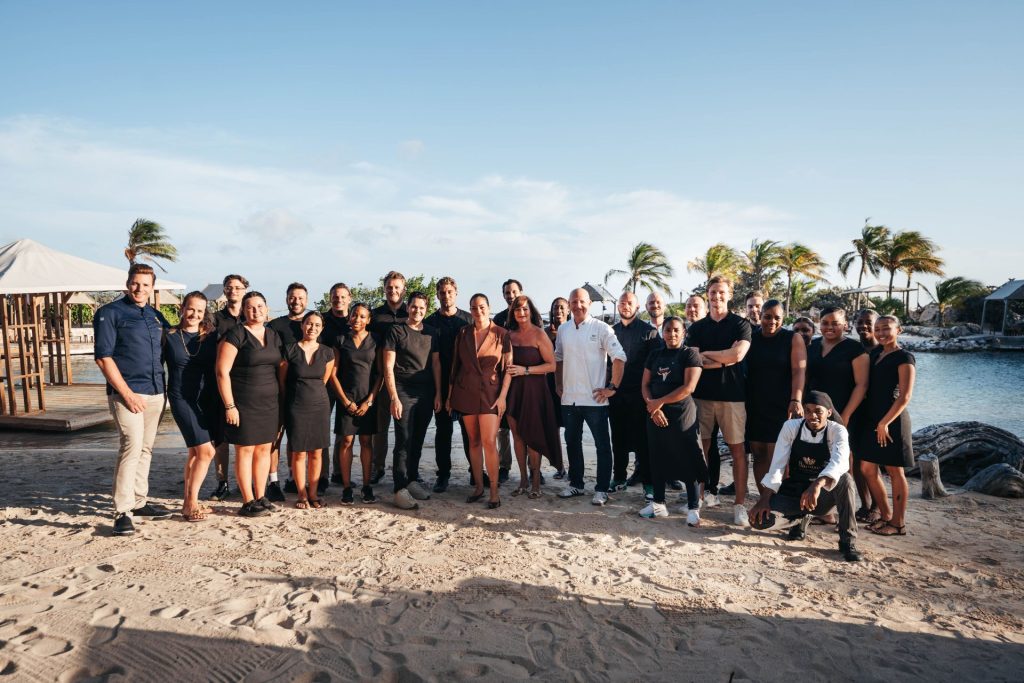 Group photo of participating chefs and team members at Baoase Luxury Resort during the culinary tribute to Jonnie Boer.